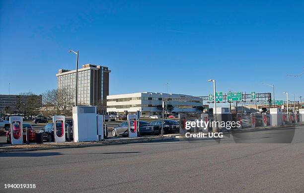 Line of cars using Electric Vehicle charging stations in Springfield, Virginia.