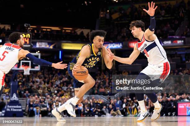 Jordan Nwora of the Indiana Pacers drives to the basket in the game against the Washington Wizards at Gainbridge Fieldhouse on January 10, 2024 in...
