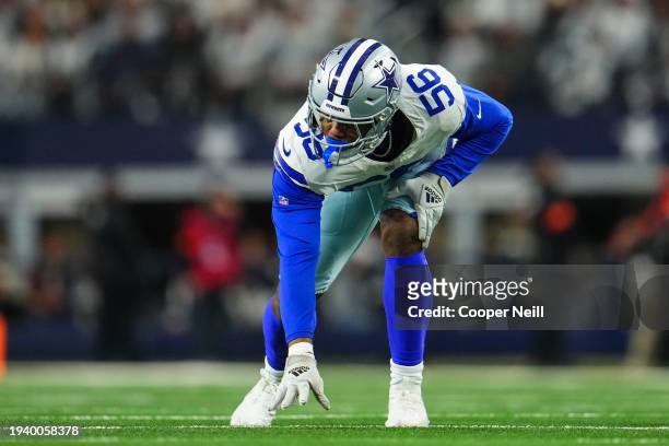 Dante Fowler Jr. #56 of the Dallas Cowboys lines up during an NFL wild-card playoff football game against the Green Bay Packers at AT&T Stadium on...
