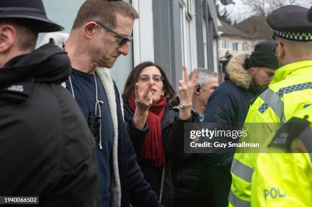 Jewish counter protestor gestures at pro Palestinian demonstrators on January 17, 2024 in Hendon, England. A British IDF soldier returning from the...