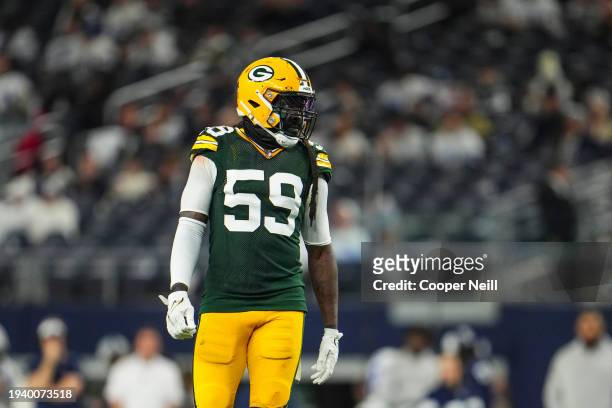 De'Vondre Campbell of the Green Bay Packers lines up during an NFL wild-card playoff football game against the Dallas Cowboys at AT&T Stadium on...