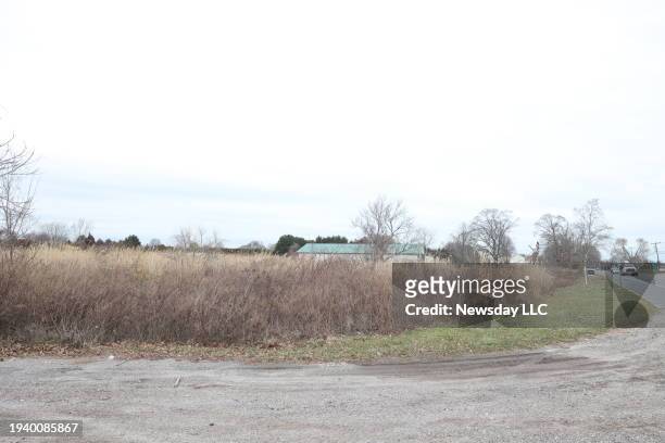 Undeveloped land at 99 Montauk Highway in Watermill, New York, that the town of Southampton proposes purchasing the property to build affordable...