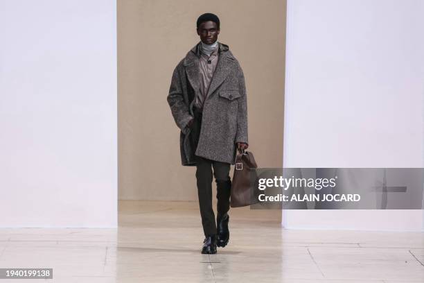 Model presents a creation for Hermes Menswear Ready-to-wear Fall-Winter 2024/2025 collection show as part of the Paris Fashion Week, at the Palais...