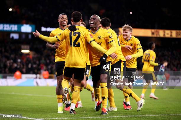 Matheus Cunha of Wolverhampton Wanderers celebrates with teammates after scoring his team's third goal during the Emirates FA Cup Third Round Replay...