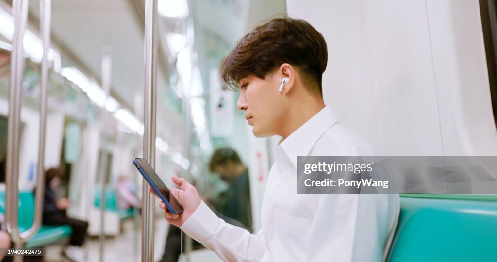 Man listen music with earbuds