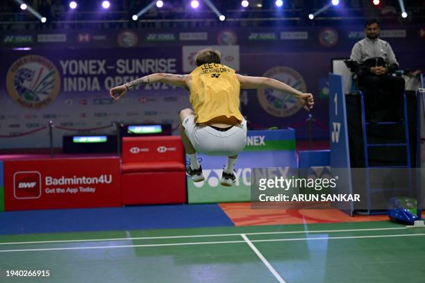 Hong Kong's Lee Cheuk Yui reacts after winning the men singles semi final match against Japan's Naraoka Kodai at Yonex-Sunrise India Open 2024 at...
