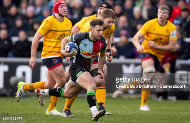 Harlequins' Danny Care on his way to scores his sides fourth try during the Investec Champions Cup match between Harlequins and Ulster Rugby at...