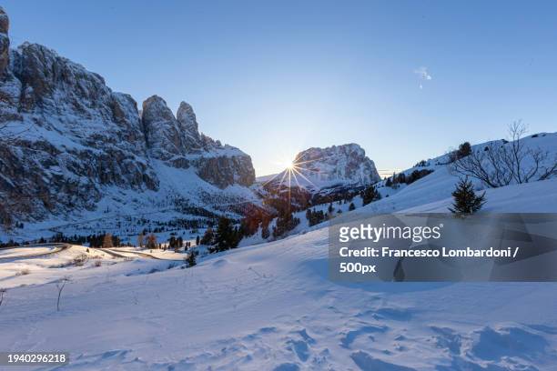 scenic view of snow covered mountains against clear sky - alta badia bildbanksfoton och bilder