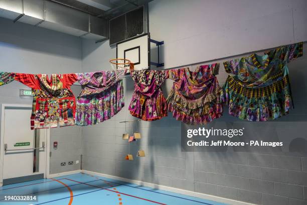 Dresses owned by Kids Company founder Camila Batmanghelidjh on display at her wake at Oasis Church Waterloo, central London, following her funeral at...