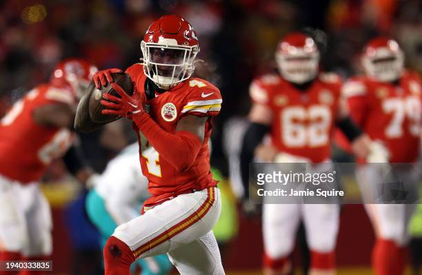 Wide receiver Rashee Rice of the Kansas City Chiefs carries the ball during the AFC Wild Card Playoff game against the Miami Dolphins at GEHA Field...
