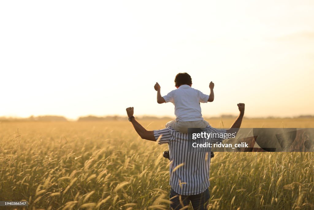 Dad and son outdoors