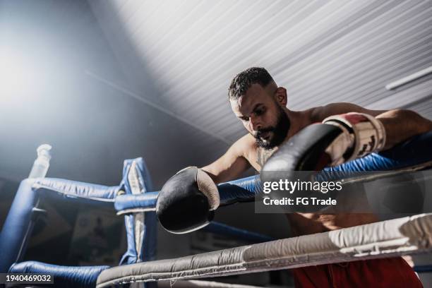 Boxer On Ropes 305 Boxing Leaning On Ropes Stock Photos, High-Res Pictures, and Images ...
