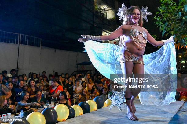 Contestant performs at a Miss Gay pageant, as their transgender community celebrates the Feast of Sto. Niño in Tondo, Manila on January 20, 2024.