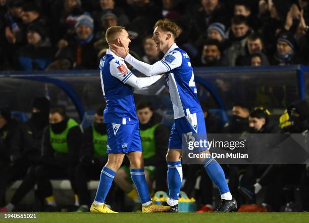 Luke McCormick of Bristol Rovers celebrates scoring his team's first goal with teammate Luke Thomas during the Emirates FA Cup Third Round Replay...