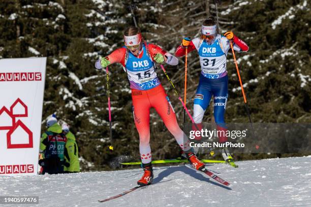 Emma Lunder of Canada and Jessica Jislova of the Czech Republic are competing in the 12.5 km short individual race at the BMW IBU World Cup in...