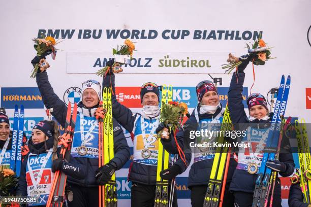 Johannes Thingnes Boe of Norway, Tarjei Boe of Norway, Karoline Offigstad Knotten of Norway and Juni Arnekleiv of Norway celebrates at the medal...