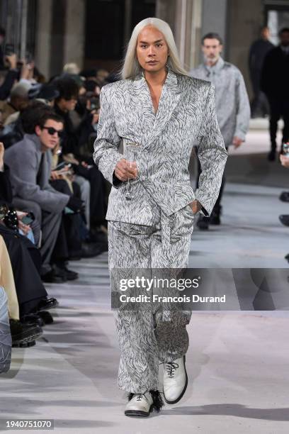 Sutan "Raja" Amrull walks the runway during the LGN Louis Gabriel Nouchi Menswear Fall/Winter 2024-2025 show as part of Paris Fashion Week on January...