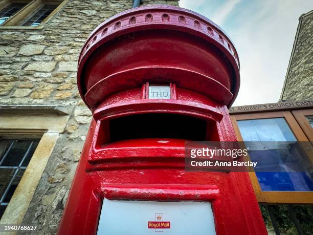 Red paint gleams on a traditional post office letter box on January 17, 2024 in Wiltshire, England. On January 10 the British Prime Minister Rishi...