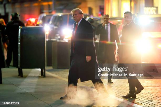 Former President Donald Trump arrives for a press conference at 40 Wall Street on January 17, 2024 in New York City. Trump held a press conference...