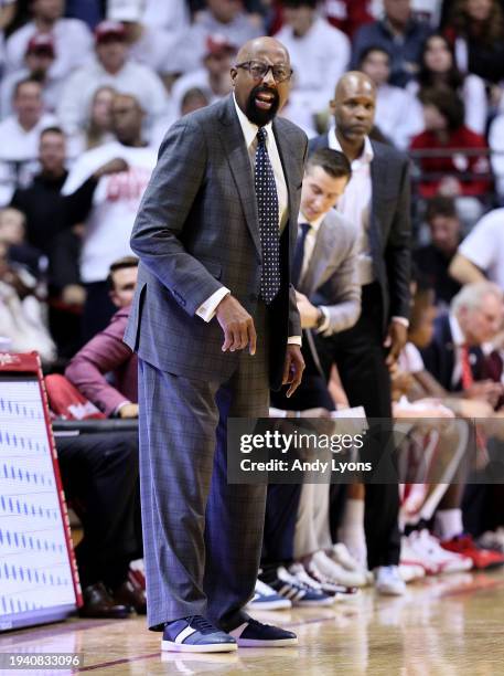 Mike Woodson the head coach of the Indiana Hoosiers gives instructions to his team in the game against the Purdue Boilermakers at Simon Skjodt...