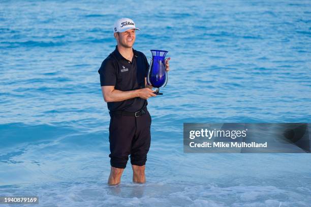 Jeremy Paul of Germany poses with the trophy after winning The Bahamas Great Exuma Classic at Sandals Emerald Bay Golf Club on January 17, 2024 in...