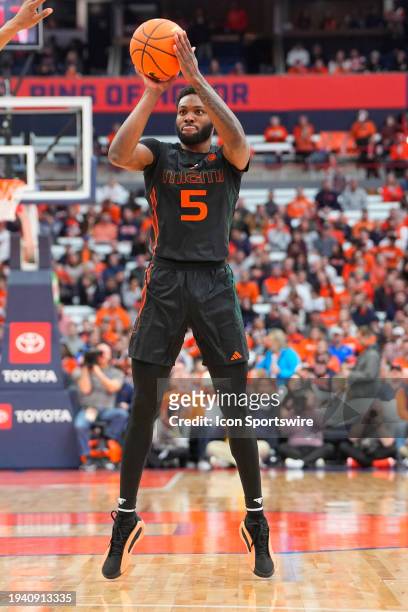 Miami Hurricanes Guard Wooga Poplar shoots a three point jump shot during the first half of the College Basketball game between the Miami Hurricanes...