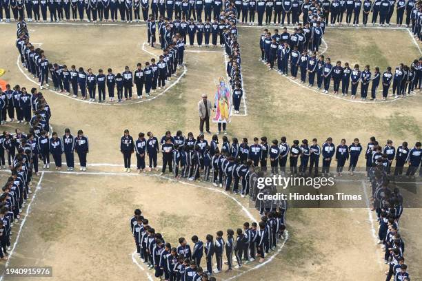 School students making human chain shown display "Jai Shri Ram" at Vidya Bal Bhawan Senior Secondary School, Mayur Vihar ahead of the Shri Ram temple...