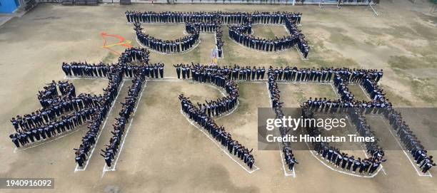 School students making human chain shown display "Jai Shri Ram" at Vidya Bal Bhawan Senior Secondary School, Mayur Vihar ahead of the Shri Ram temple...