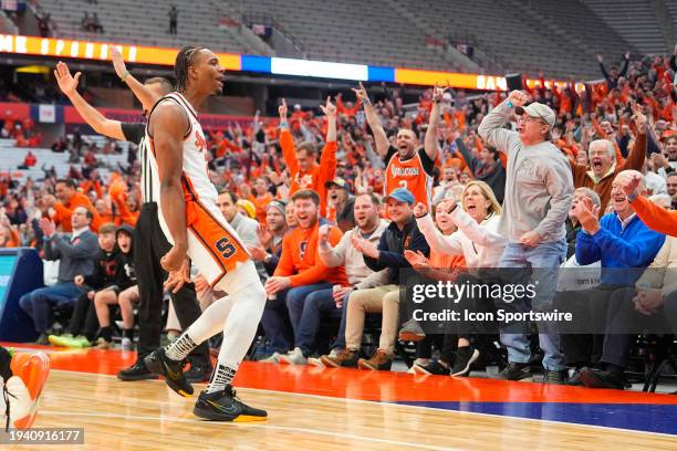 Syracuse Orange Guard JJ Starling reacts to making a three point shot during the second half of the College Basketball game between the Miami...