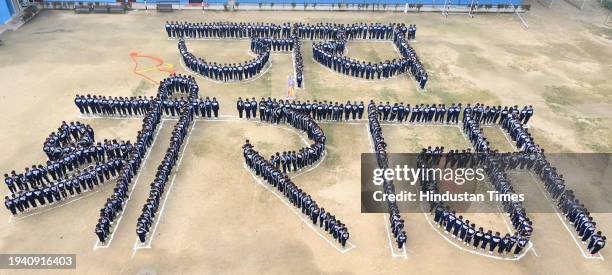 School students making human chain shown display "Jai Shri Ram" at Vidya Bal Bhawan Senior Secondary School, Mayur Vihar ahead of the Shri Ram temple...