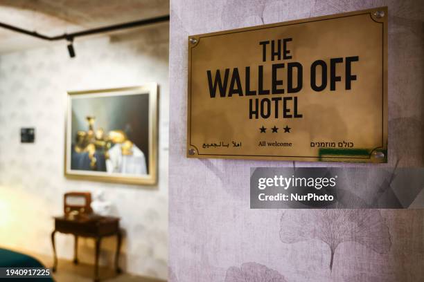 The Walled Off Hotel room reconstruction is seen inside Banksy Museum in Krakow, Poland on January 20th, 2024. An exhibition inspired by Banksy's...