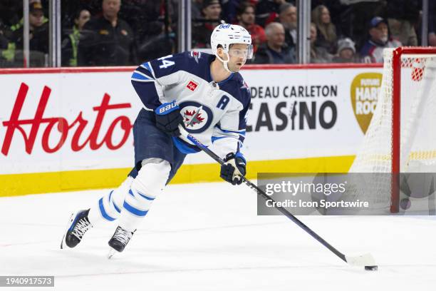 Winnipeg Jets Defenceman Josh Morrissey skates with the puck during first period National Hockey League action between the Winnipeg Jets and Ottawa...