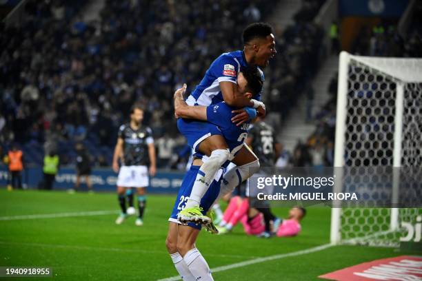 Porto's Brazilian defender Wendell celebrates scoring his team's fourth goal during the Portuguese League football match between FC Porto and...