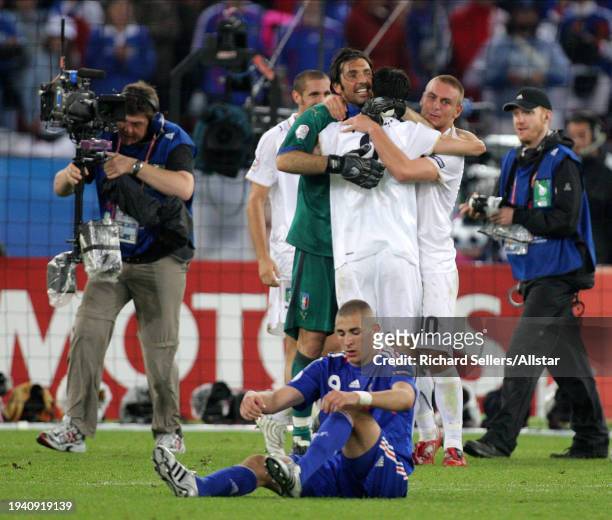 June 17: Karim Benzema of Italy is dejected with Gianluigi Buffon and Daniele De Rossi of Italy celebrate winning the UEFA Euro 2008 Group C match...