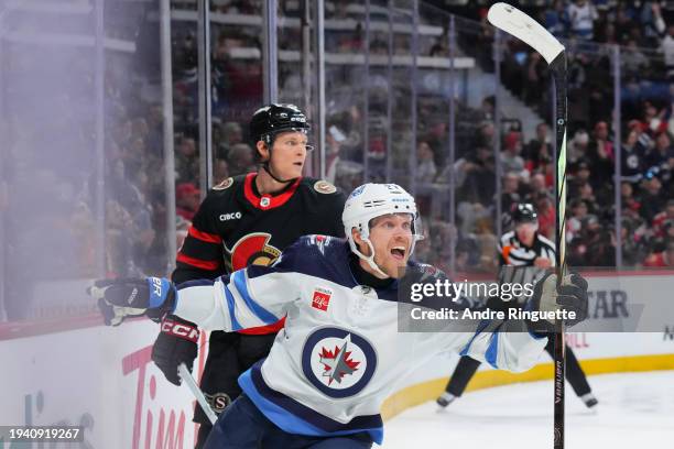 Nikolaj Ehlers of the Winnipeg Jets celebrates his overtime winning goal against the Ottawa Senators at Canadian Tire Centre on January 20, 2024 in...