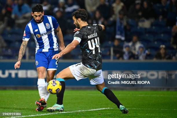Porto's Argentine midfielder Alan Varela scores his team's fifth goal instead of Moreirense's Brazilian defender Marcelo during the Portuguese League...