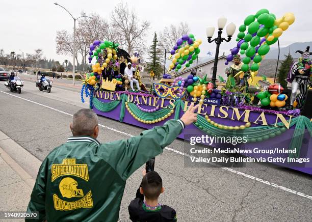 San Bernardino, CA Fans wave to Heisman Trophy winner and 2019 Cajon High School graduate Jayden Daniels during a homecoming ceremony parade for the...