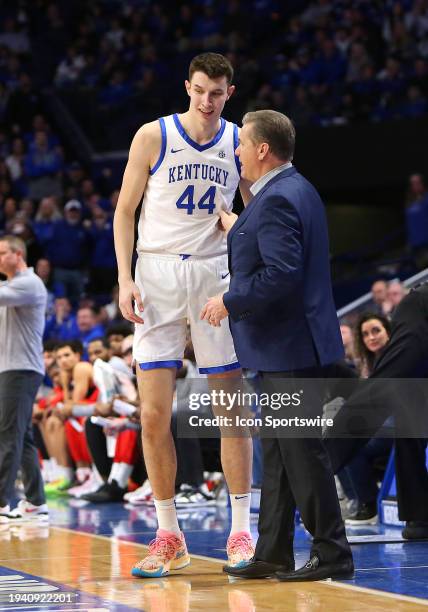 Kentucky Wildcats head coach John Calipari talks with forward Zvonimir Ivisic in a game between the Georgia Bulldogs and the Kentucky Wildcats on...
