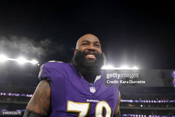 Morgan Moses of the Baltimore Ravens celebrates after an NFL Divisional Round playoff game against the Houston Texans at M&T Bank Stadium on January...