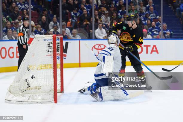 Elias Pettersson of the Vancouver Canucks scores a goal on Martin Jones of the Toronto Maple Leafs during the third period of their NHL game at...