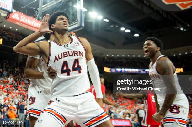 Dylan Cardwell of the Auburn Tigers celebrates after dunking the ball during the second half of their game against the Mississippi Rebels at Neville...