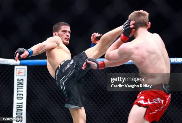 Arnold Allen of England fights against Movsar Evloev of Russia in a featherweight bout during the UFC 297 event at Scotiabank Arena on January 20,...