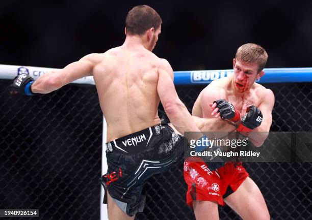 Arnold Allen of England fights against Movsar Evloev of Russia in a featherweight bout during the UFC 297 event at Scotiabank Arena on January 20,...