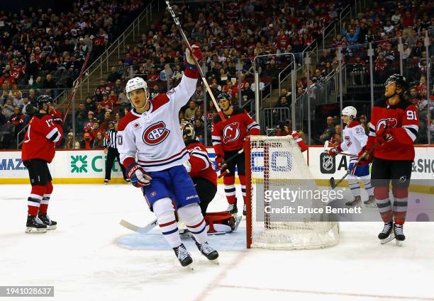 Juraj Slafkovsky of the Montreal Canadiens celebrates his first period goal against Nico Daws of the New Jersey Devils at Prudential Center on...