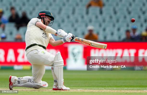 Travis Head of Australia bats during day two of the First Test in the Mens Test match series between Australia and West Indies at Adelaide Oval on...