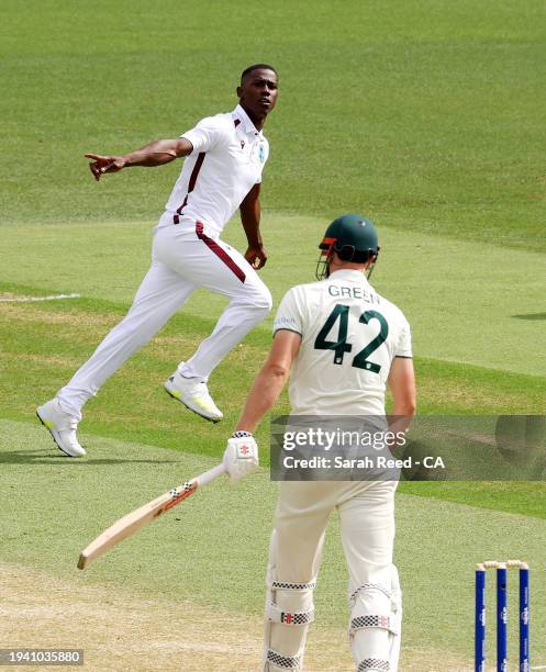 Shamar Jospeh of the West Indies celebrates getting the wicket of Cameron Green of Australia for 14 runs, caught Joshua DaSilva of the West Indies...