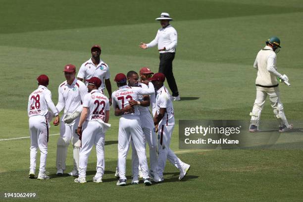 Justin Greaves of the West Indies celebrates the wicket of Usman Khawaja of Australia during day two of the First Test in the Mens Test match series...