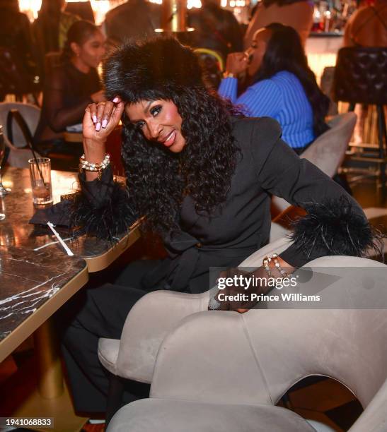 Momma Dee attends Face Card Sundays All Black Dinner Party at Knife Modern Mediterranean on January 14, 2024 in Atlanta, Georgia.