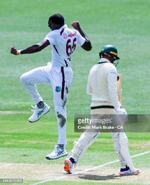 Justin Greaves of the West Indies celebrates the wicket of Usman Khawaja of Australia during day two of the First Test in the Mens Test match series...