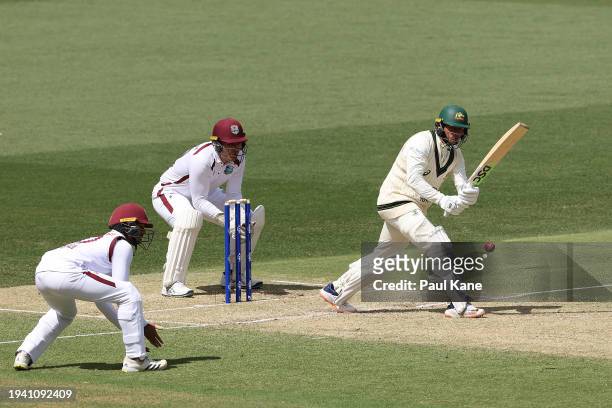 Usman Khawaja of Australia bats during day two of the First Test in the Mens Test match series between Australia and West Indies at Adelaide Oval on...